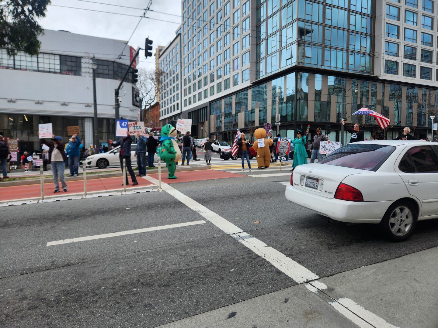 Protest against ICE, Vann Ness Ave in front of the Tesla dealership.
